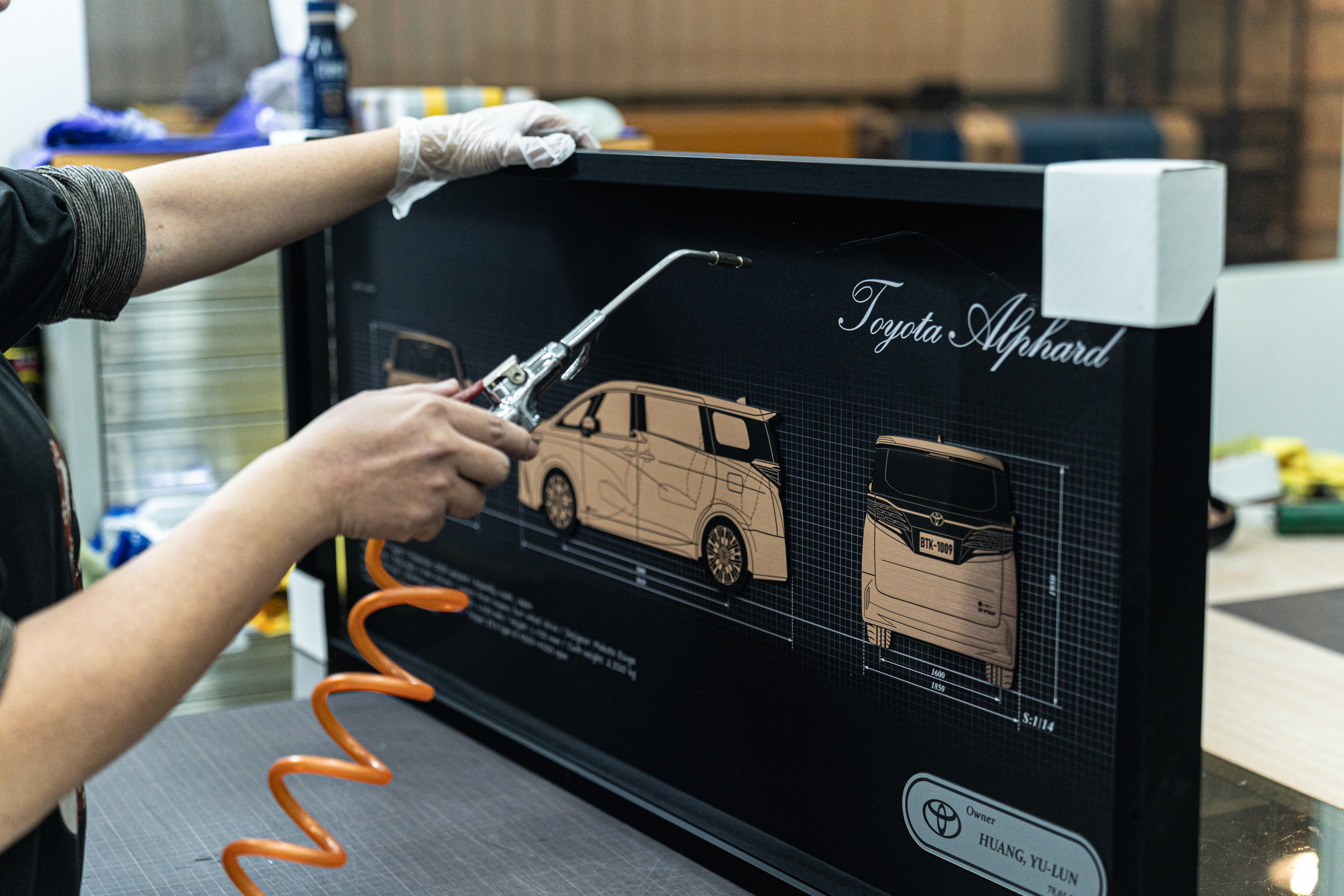 Final inspection of automotive artwork